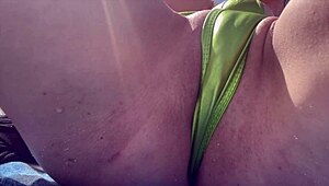 Italian milf flaunts tight shaved pussy closeup at miami public beach