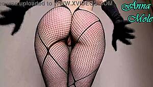 look at this pawg slut in fishnets and black gloves spanking her big ass while riding dildo