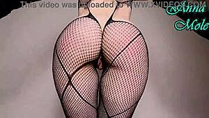 look at this pawg slut in fishnets and black gloves spanking her big ass while riding dildo