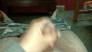 mature guy grips his penis tight jerking at high speed with raw emotion