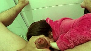 Why hide when this newbie loves slurping huge cock in bathroom?