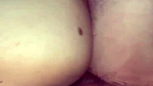 redhead shakes her big ass and spreads wet pussy wide