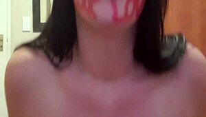 She punishes herself through pissing slaps gags and raw dirty talk