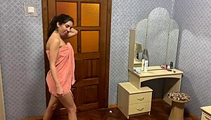 Katty West spreads for sweet vanilla cream on her wet shaved pussy