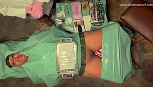Nurse rosie squirms under mistress april's electro piercing pussy torment