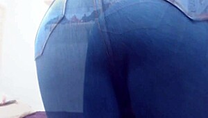 wanna see this shemale redhead stroke her juicy cock thru tight jeans?