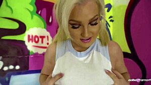 Blonde babe pulls out her big boobs and teases hard nipples