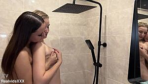 Two sensual girls share steamy bath kissing nipples licking shaved pussies tenderly