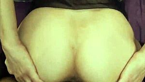 mature wife slips into stockings as her ass quivers softly.