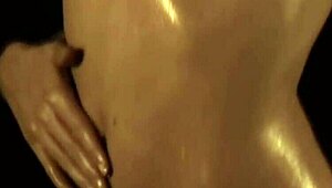 exotic oriental dancer slowly teases naked body erotically