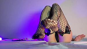 in the bedroom the goth housewife in fishnets gives a teasing footjob pov close up