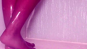 wet nylons cling to teasing toes as she showers pantyhose feet slowly
