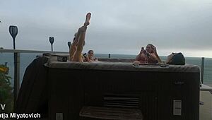 babes splash and play carefree in the backyard hot tub