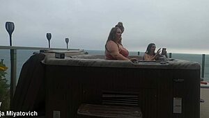 babes splash and play carefree in the backyard hot tub