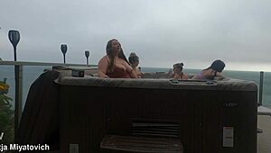 babes splash and play carefree in the backyard hot tub