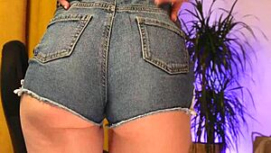 her fat ass and big pussy lips bulging from tight denim shorts