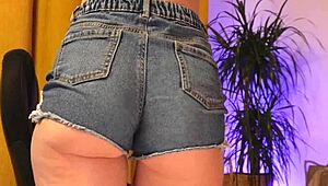 her fat ass and big pussy lips bulging from tight denim shorts