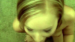 pretty blonde babe gives a teasing blowjob with her sexy lips