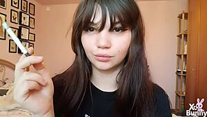 romanian brunette goddess smokes cigarette showing big bare pussy lips up close in pov