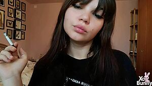 romanian brunette goddess smokes cigarette showing big bare pussy lips up close in pov