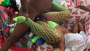 we share a tender moment on the couch with soft touches and close connection