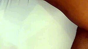 A beautiful black amateur slowly takes off panties in bedroom