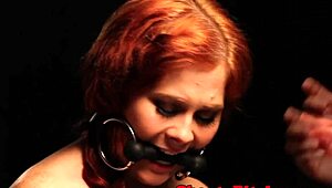 redhead tattooed femdom straps down sub for rough mistreatment