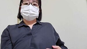 A married Japanese milf shakes her big tits while masturbating lewdly at wedding