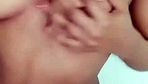 check out this sexy african kenyan milf flashing yummy natural tits on webcam solo fingering tight pussy