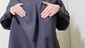 A married Japanese milf shakes her big tits while masturbating lewdly at wedding