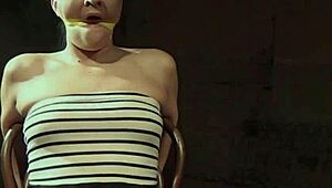 dom chokes ponytail smalltits sub with toys gagging her shaved pierced body in bondage closeup