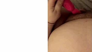 Katie rubs clit close-up with buzzing vibrator on wet pussy