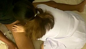 Horny Thai nurse fucks cute friend's wet pussy in hospital bed