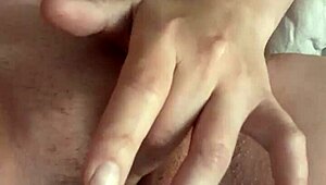 French milf fingers dripping pussy close-up then slams dildo for intense squirting orgasm