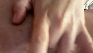 French milf fingers dripping pussy close-up then slams dildo for intense squirting orgasm