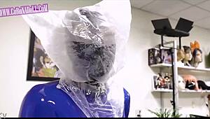 gas mask on, rubber latex catsuit tight... ready for this b play bondage? 