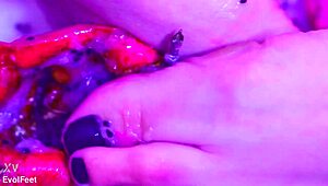 Bare toes crush juicy fruit