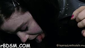 frisky brunette slave bound in bdsm gets deep hardcore sex toy action and blowjob