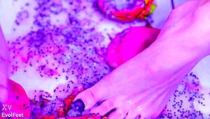 Bare toes crush juicy fruit