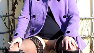 cute milf puffs cigarette outdoors with dildo stuffed in shaved pussy