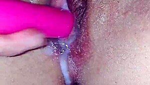 Intense pleasure builds close up on shaved big pussy lips toy orgasm waves