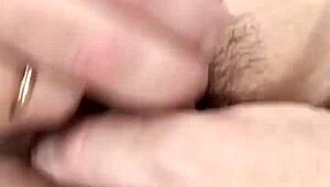 A humiliated guy with tiny cock sniffs panties while undressing slowly