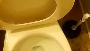21 YEAR OLD TAKES A PISS IN TOILET WITH BIT OF PENIS SHOWING OLD MAN WATCHES CLOSE