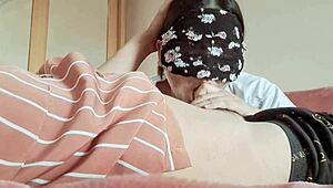 The Malay celebrity kneels and eagerly sucks her boyfriend's throbbing cock deep