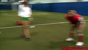 sorority pledges get licked during hazing on the soccer field