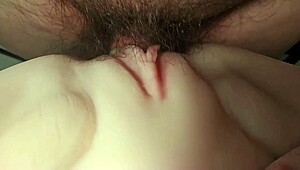 he casually slides into her big shaved pussy close-up like a real fuck doll with toys