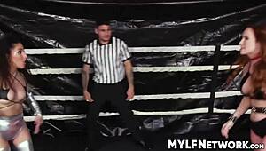 Fishnet-clad redhead milf dominated in hardcore wrestling with deepthroat and cumshot