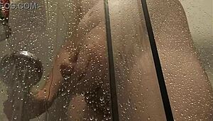 big cock unloads steamy jizz while stroking in the hot shower