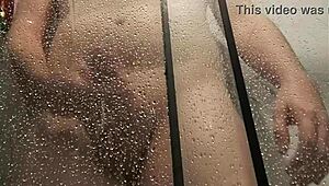 big cock unloads steamy jizz while stroking in the hot shower