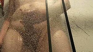 big cock unloads steamy jizz while stroking in the hot shower